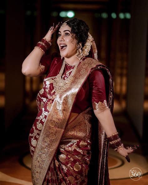 Poorna Shines Like An Angel With Gold Ornaments At Her Grand Baby .